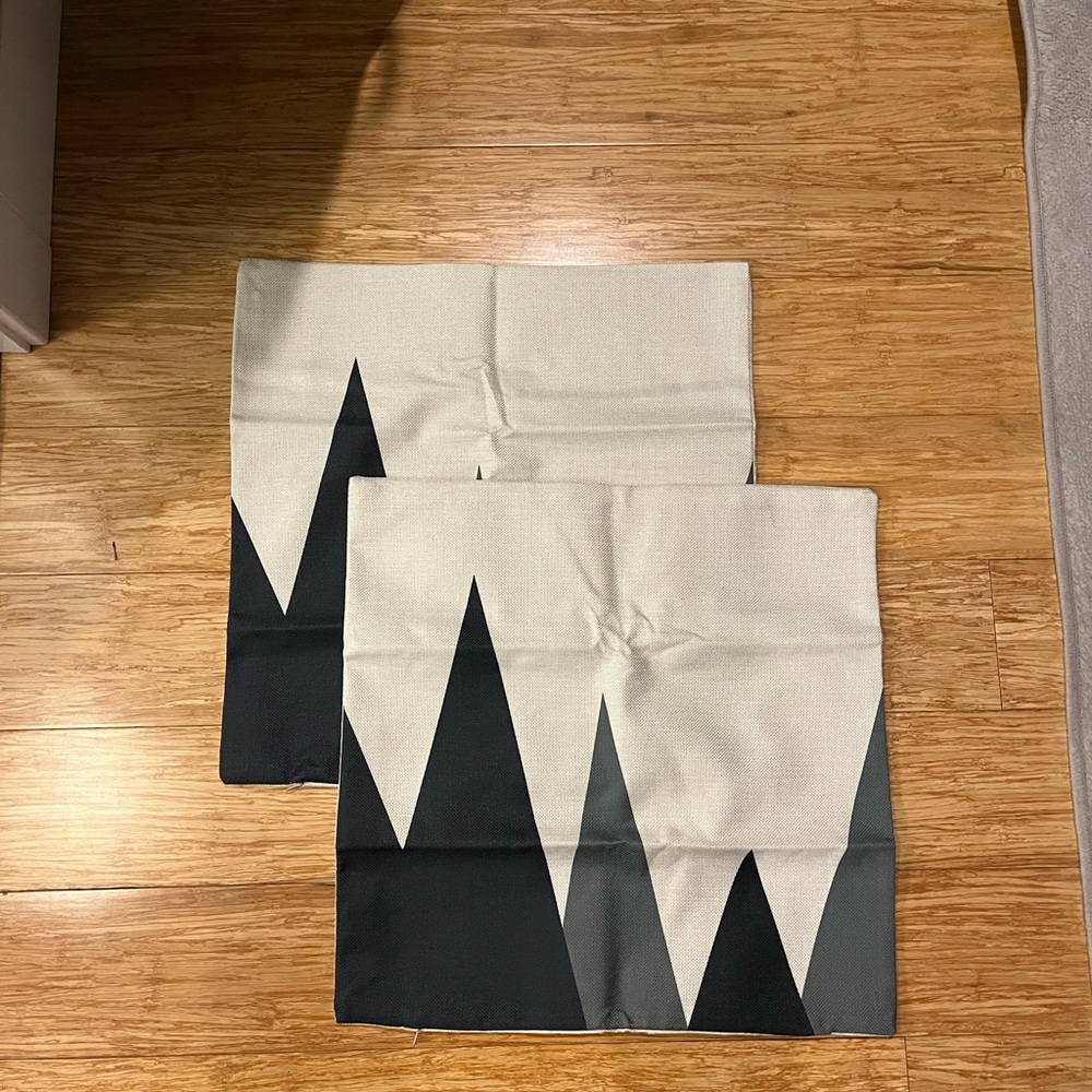 Lot of two outdoor/indoor pillow coverings. NWOTs.